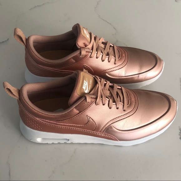 nike thea rose gold